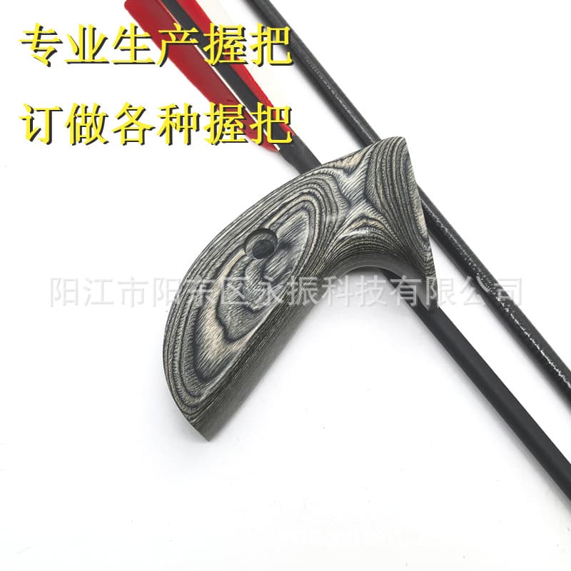 Production of bow grip push handles, CNC production of recurve bow grips, colored wooden bow grips, bow handles, wooden bow grips