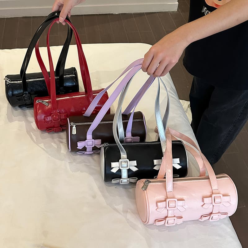 Bow new style bag for women in summer, simple retro one-shoulder armpit baguette bag, textured women's casual handbag
