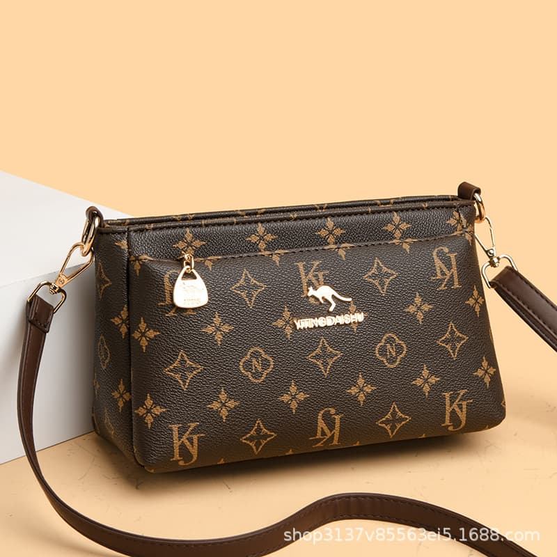 Multi-layer pocket women's bag soft leather texture 2026 new mother bag middle-aged single shoulder crossbody bag fashionable versatile bag