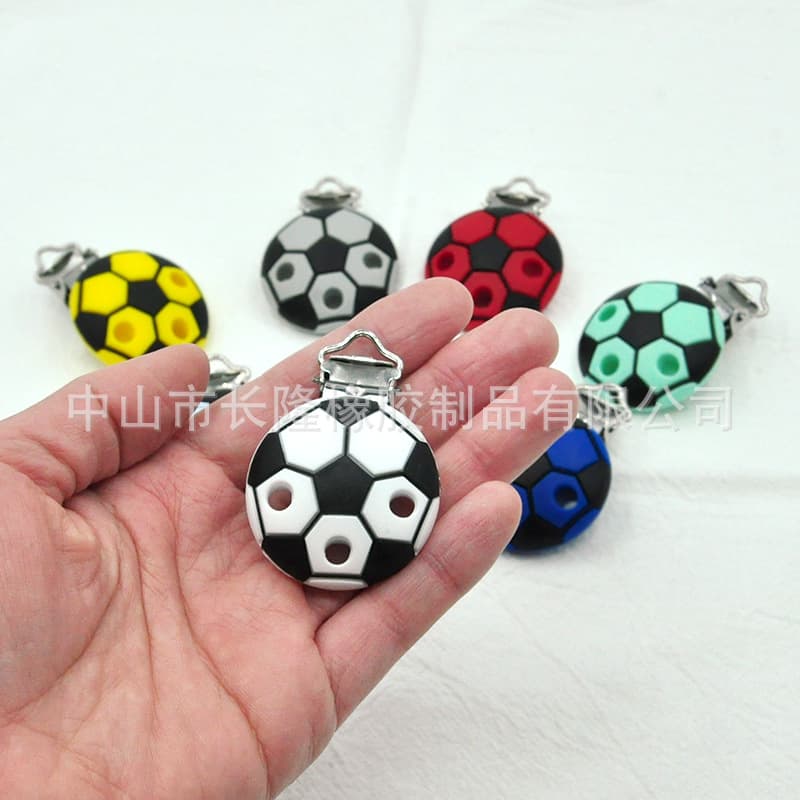Factory direct sales of various popular silicone teething pacifier chains, baby teething silicone football pacifier clips wholesale