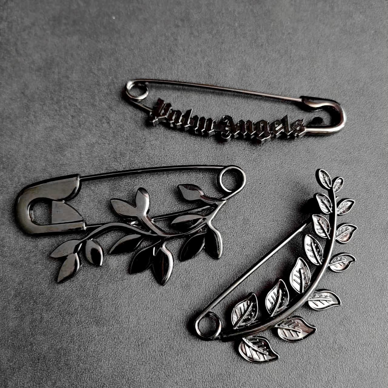 JIEMING zinc alloy hanging plated black gun color leaf graphic pin special-shaped highlight pin brand