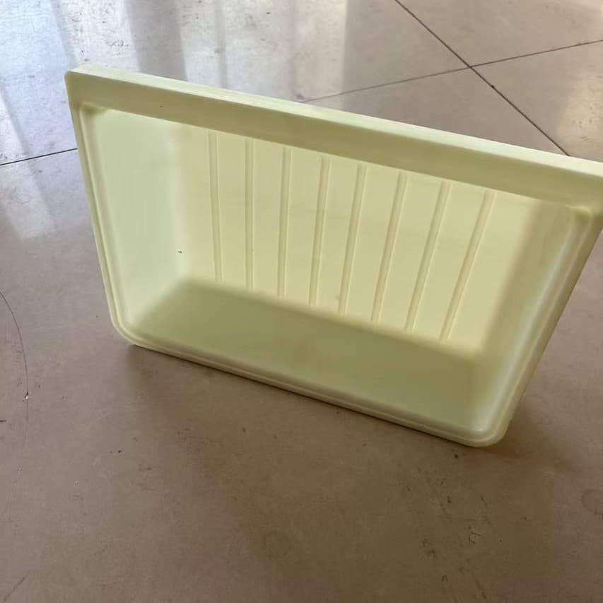 Tesla under-seat storage box modification with cover