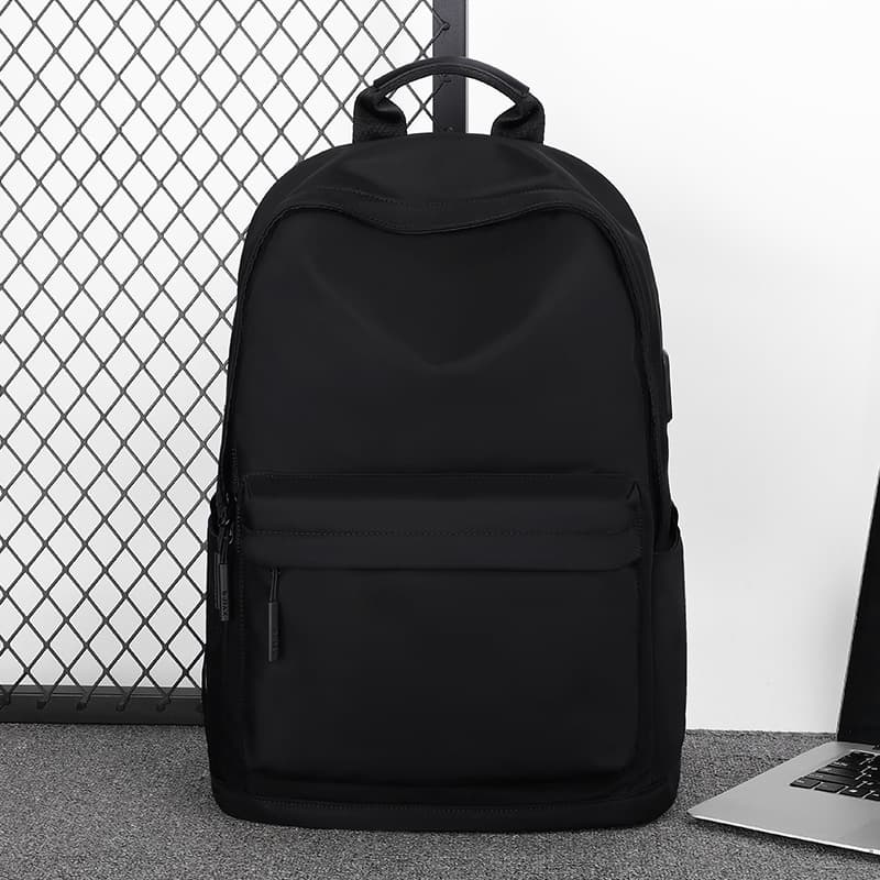 Cross-border wholesale lightweight stylish laptop backpack for middle school, high school, and college students, men's large-capacity canvas backpack