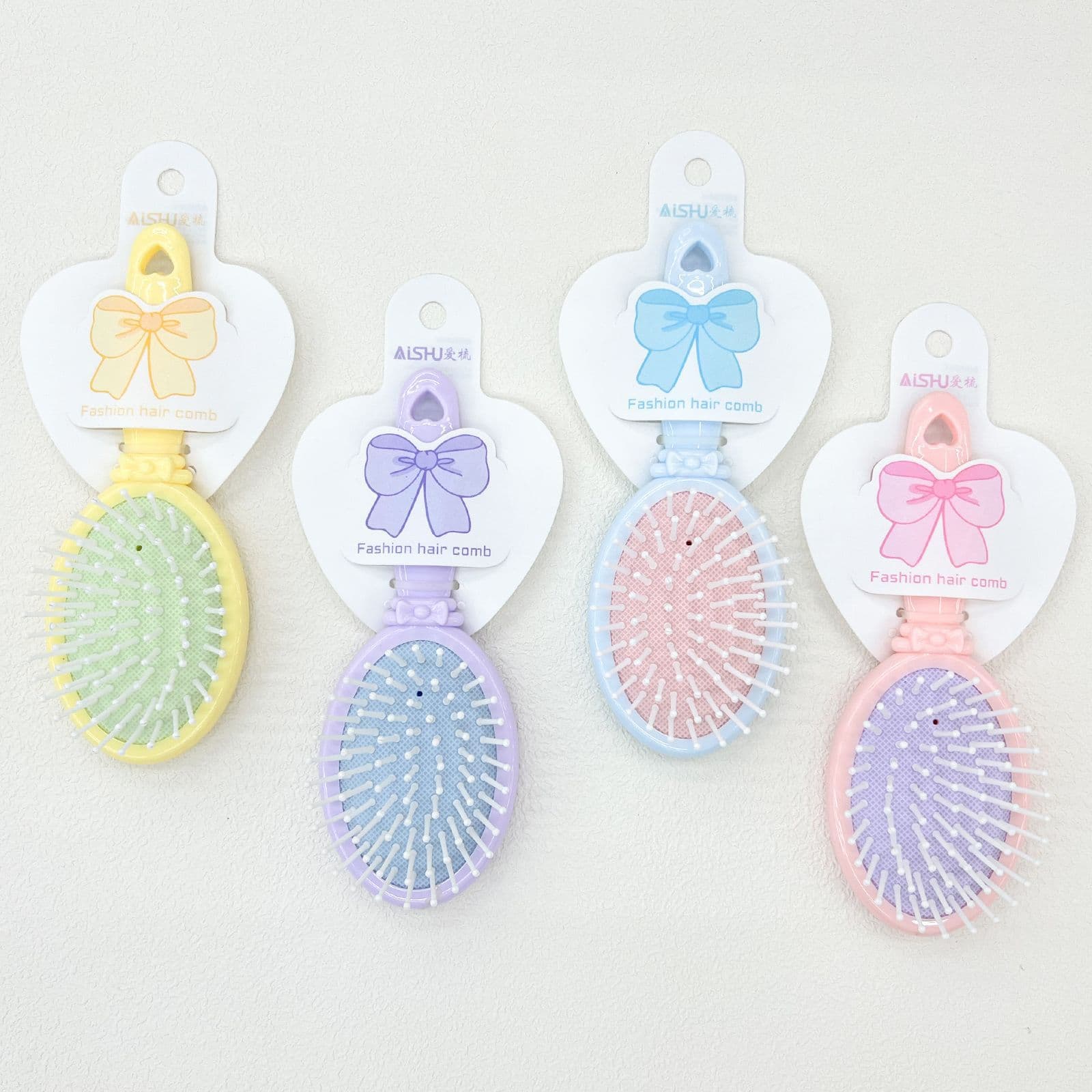 Wholesale new air cushion comb mini cartoon air bag comb hair massage comb portable candy color elevator comb