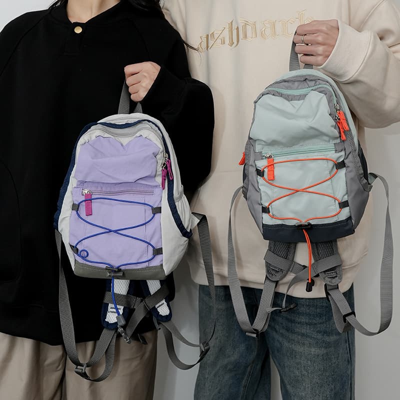 Japanese-style cute drawstring mini backpack for women, perfect for hiking and casual wear.