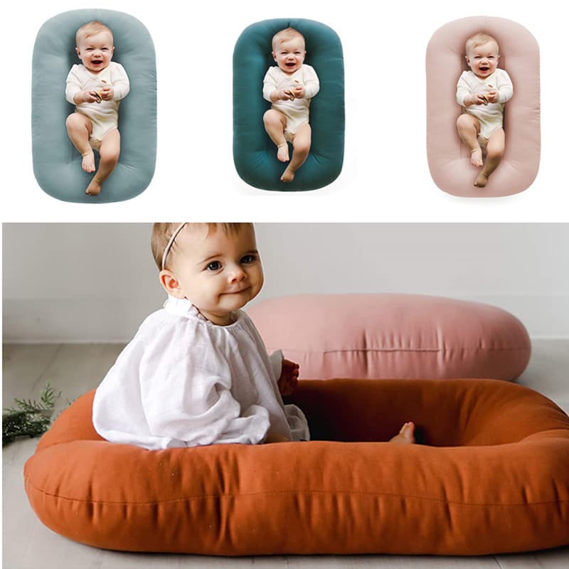 Cross-border pure cotton newborn uterus bionic bed, portable, washable and foldable baby bed, factory direct sales.