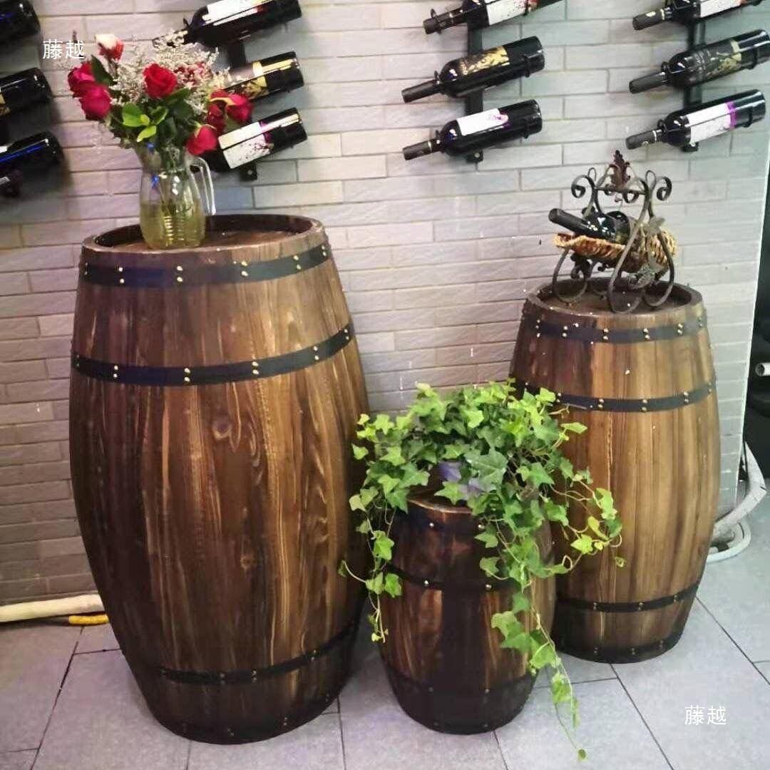 Decorative wooden barrels for dry red wine, beer, brandy, oak, wine, empty barrels, and weddings.