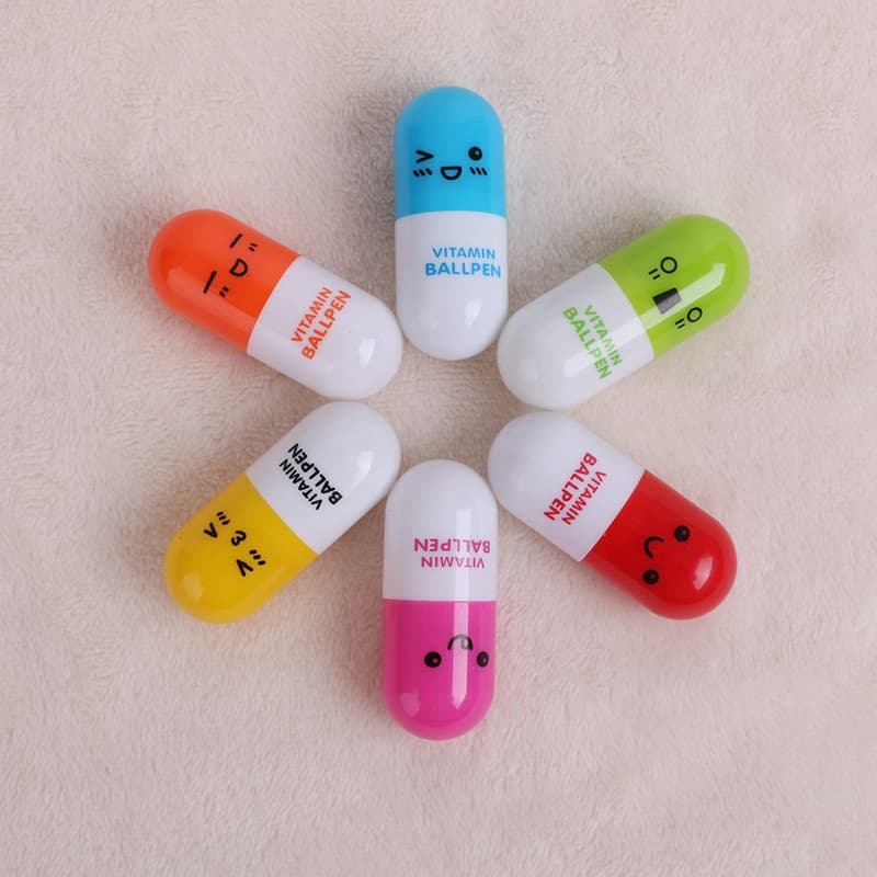 Cute expression pill pen telescopic capsule shape ballpoint pen creative stationery elementary school students cartoon gift pen quick-drying
