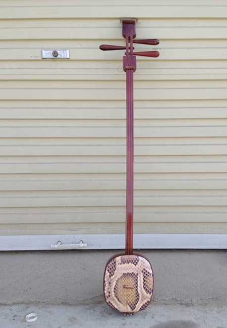 Factory Direct Tianqin Props Large, Medium, and Small Sanxian Pendant Book Ethnic Musical Instrument Yi Nationality Sanxian Small Sanxian Banhu