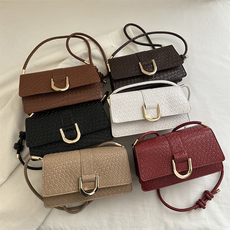 Woven pattern temperament 2026 large capacity new texture retro fashion casual portable armpit single shoulder baguette women's bag