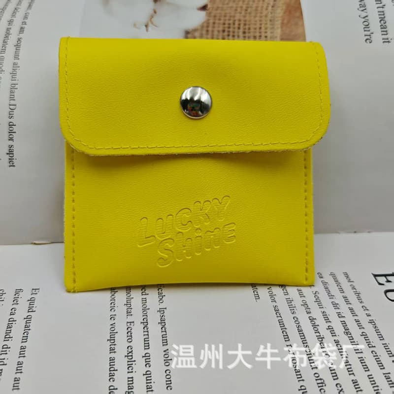PU snap fastener flip-top bag for earrings, bracelets, necklaces, earphone accessories storage bag, customizable size and logo wholesale
