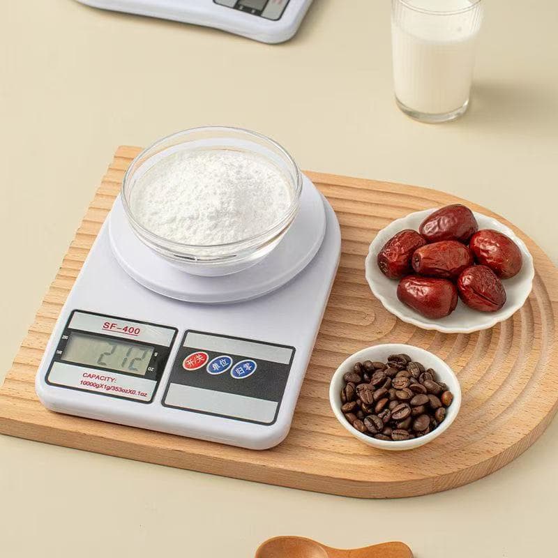 Small, high-precision electronic scale for kitchens, baking, and home use; accurately weighs food in grams.