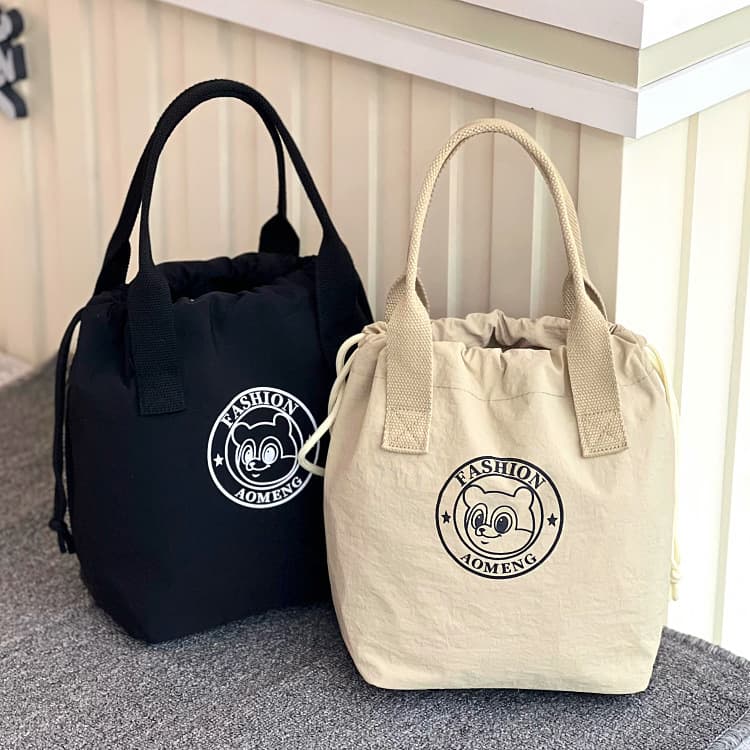 New fashionable waterproof drawstring pocket portable insulated bucket bag commuter lunch box bag lunch bag pump-out mommy bag bucket bag